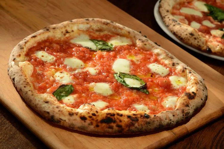 Pizzaiolo Primo signature dishes Pizza MargheritaSpaghetti PomodoroProsciutto Arugula Pizza